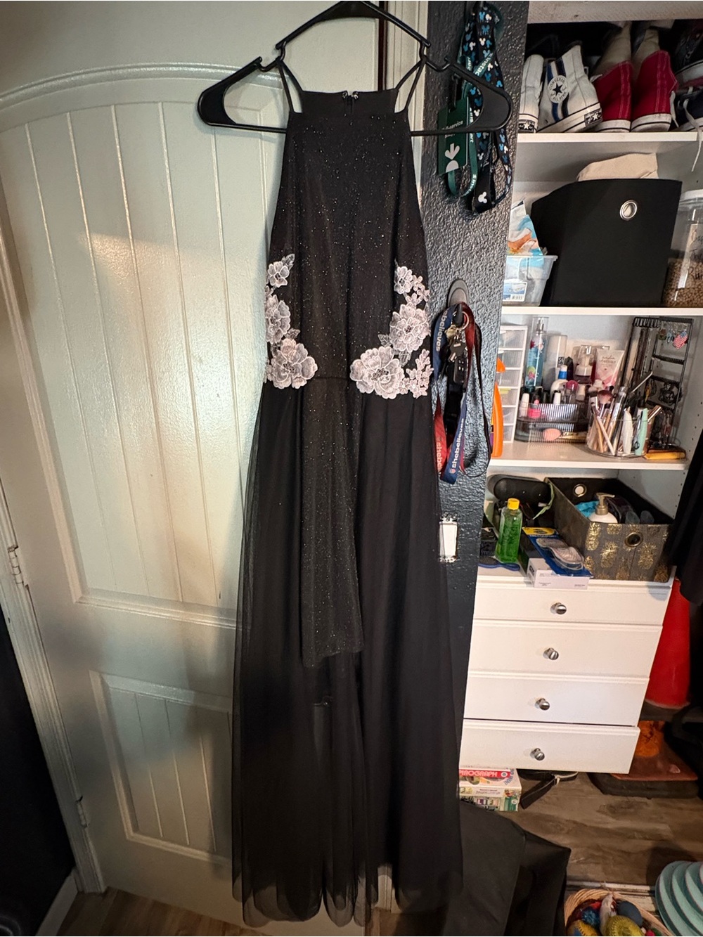 Elegant Black Halter Gown with White Floral Appliqué